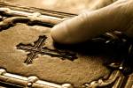 hand on religious book